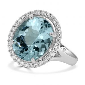 Oval aquamarine with round diamond halo ring