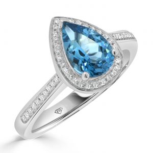 Pear London Blue with round diamond halo ring