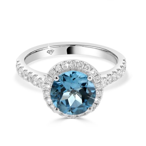 18ct White Gold Blue Topaz and Diamond Halo Ring