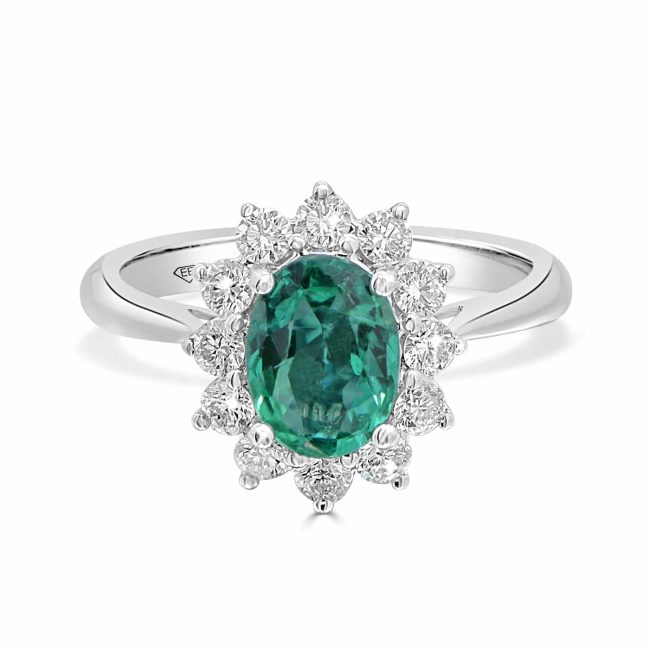 Emerald Ring in 18kt White Gold with Diamond HaloEmerald ring in 18kt white gold featuring a 1.13ct oval emerald surrounded by a diamond halo.