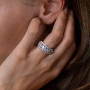 Woman wearing a sparkling ring.