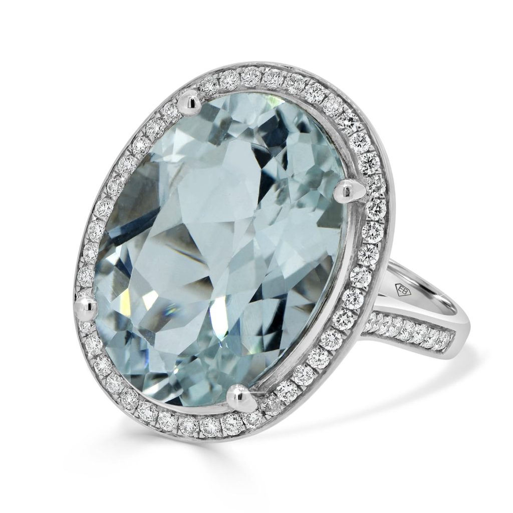 Aquamarine oval cut with diamond halo engagement ring