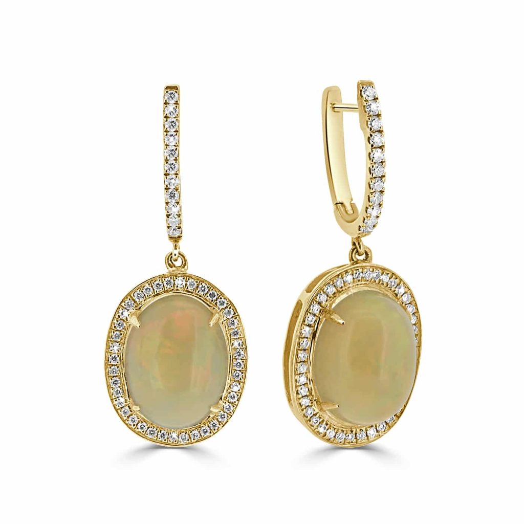 Opal earrings featuring oval-cut opals with diamond halos in 18ct white gold.