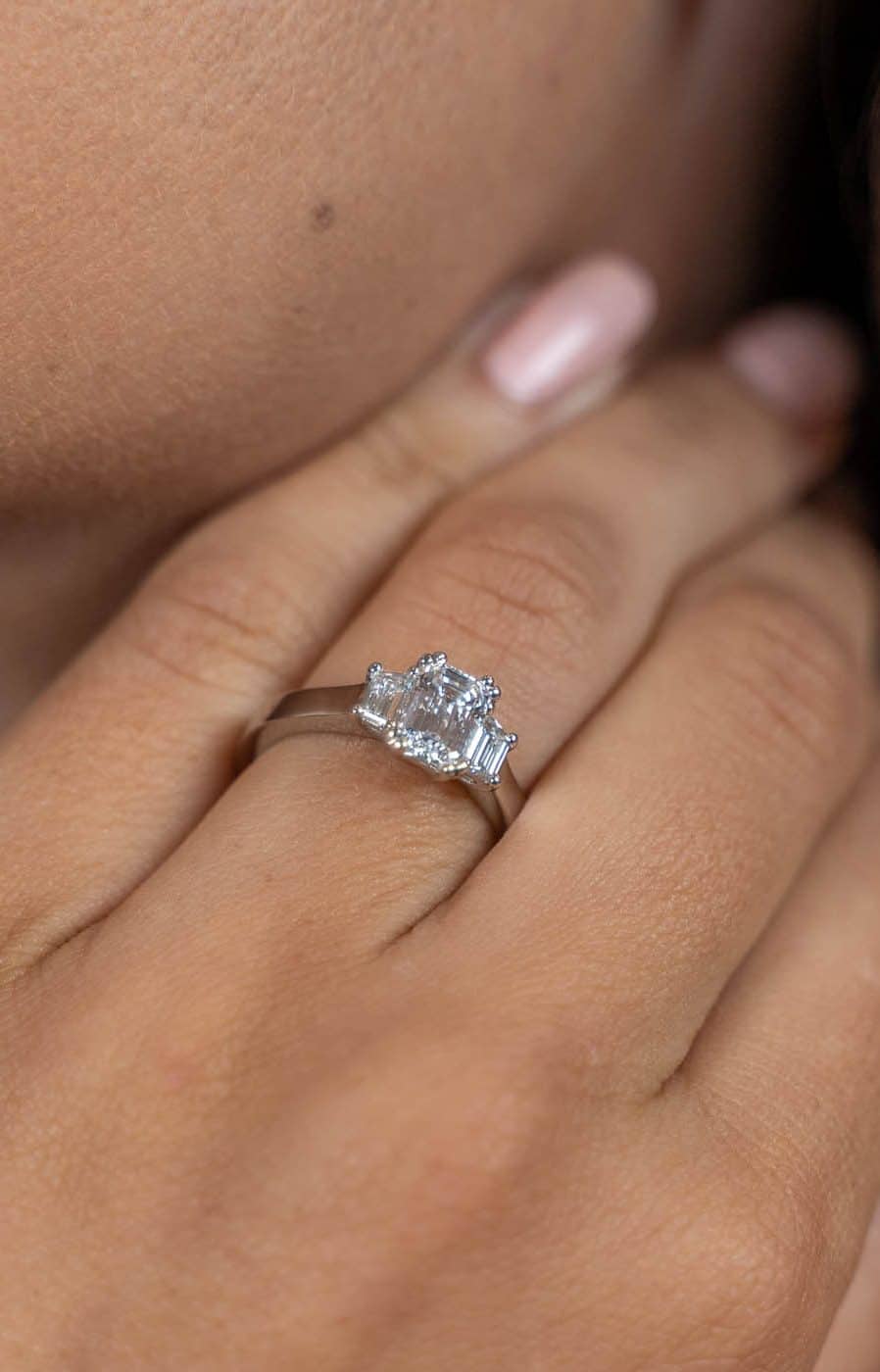 Three-stone diamond engagement ring
