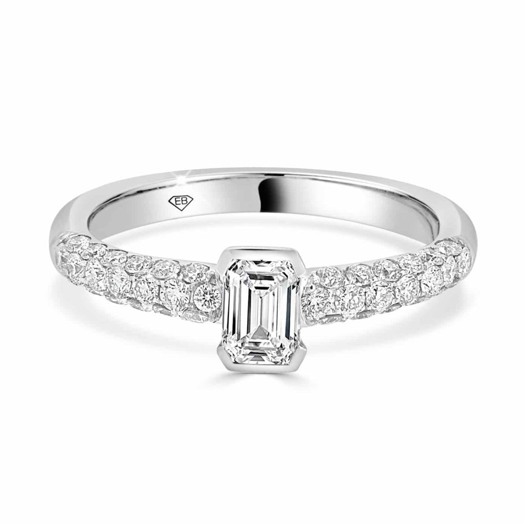 Emerald Cut Engagement ring with diamonds on the band