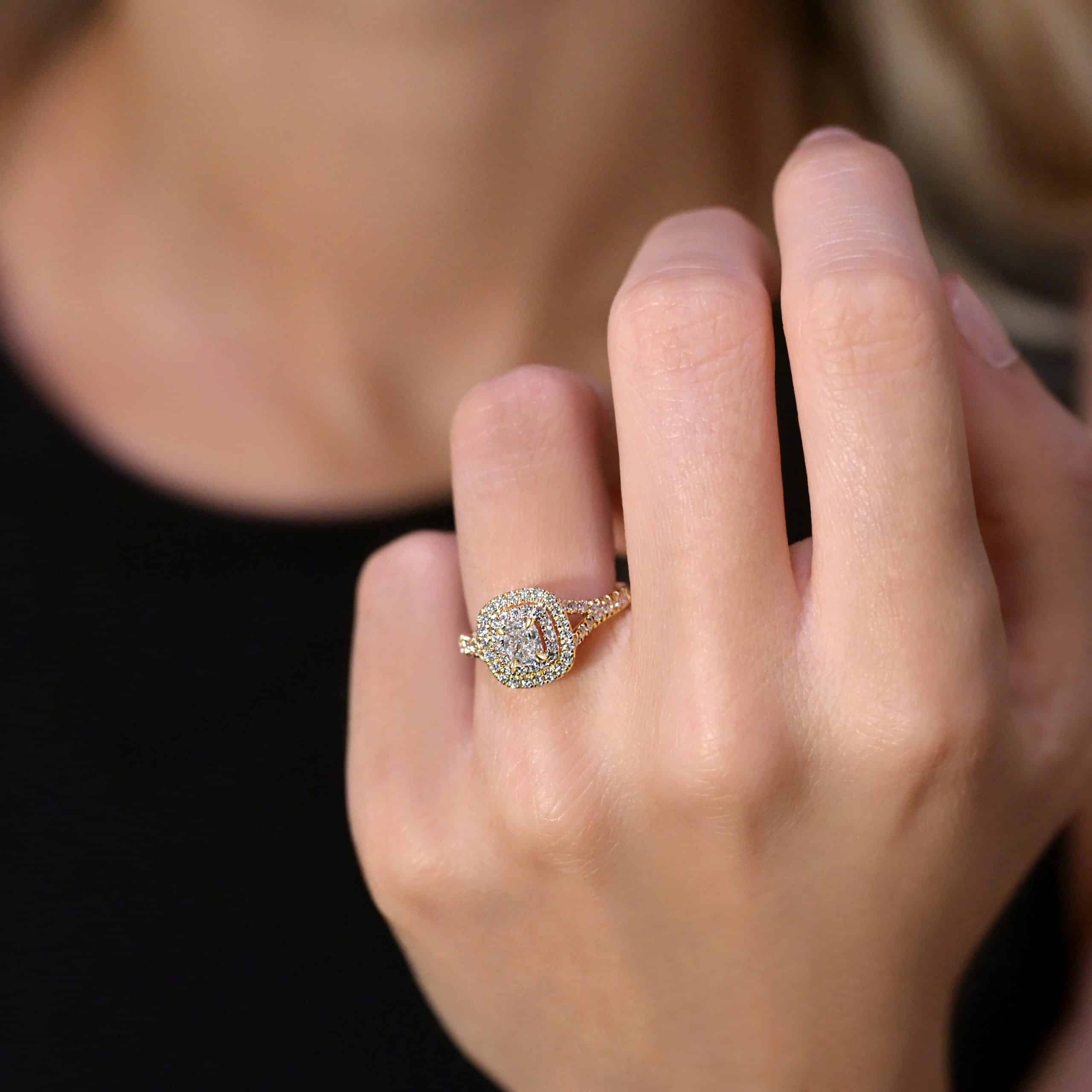 Cushion cut double halo engagement ring