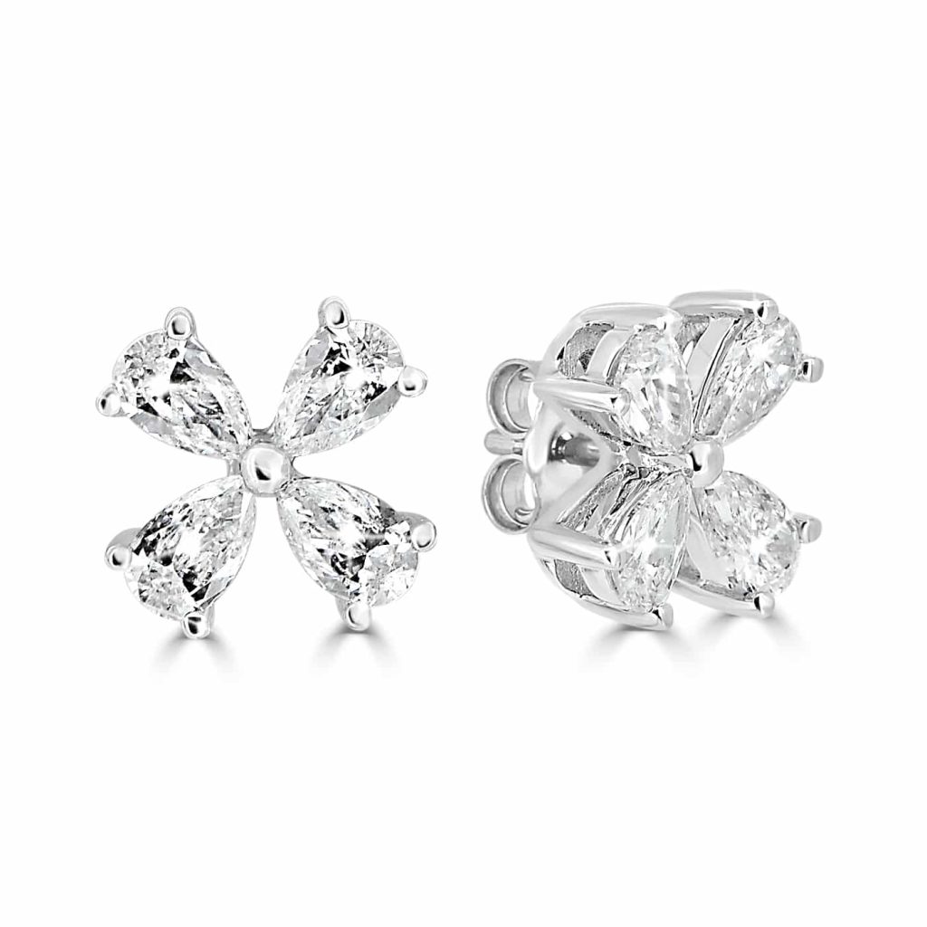 Diamond stud earrings in 18ct white gold with floral design