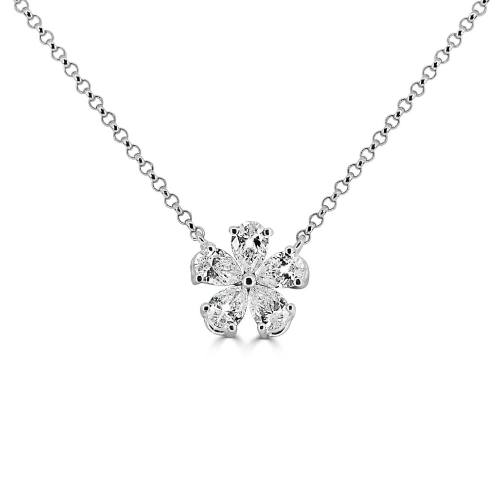 Diamond flower pendant necklace with natural diamonds in 18kt white gold, available in rose and yellow gold.