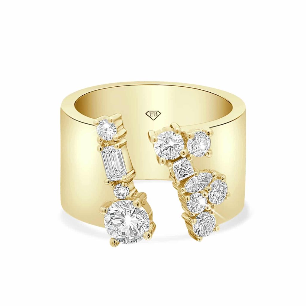Lab diamond ring with round and baguette diamonds set in 18ct yellow gold.