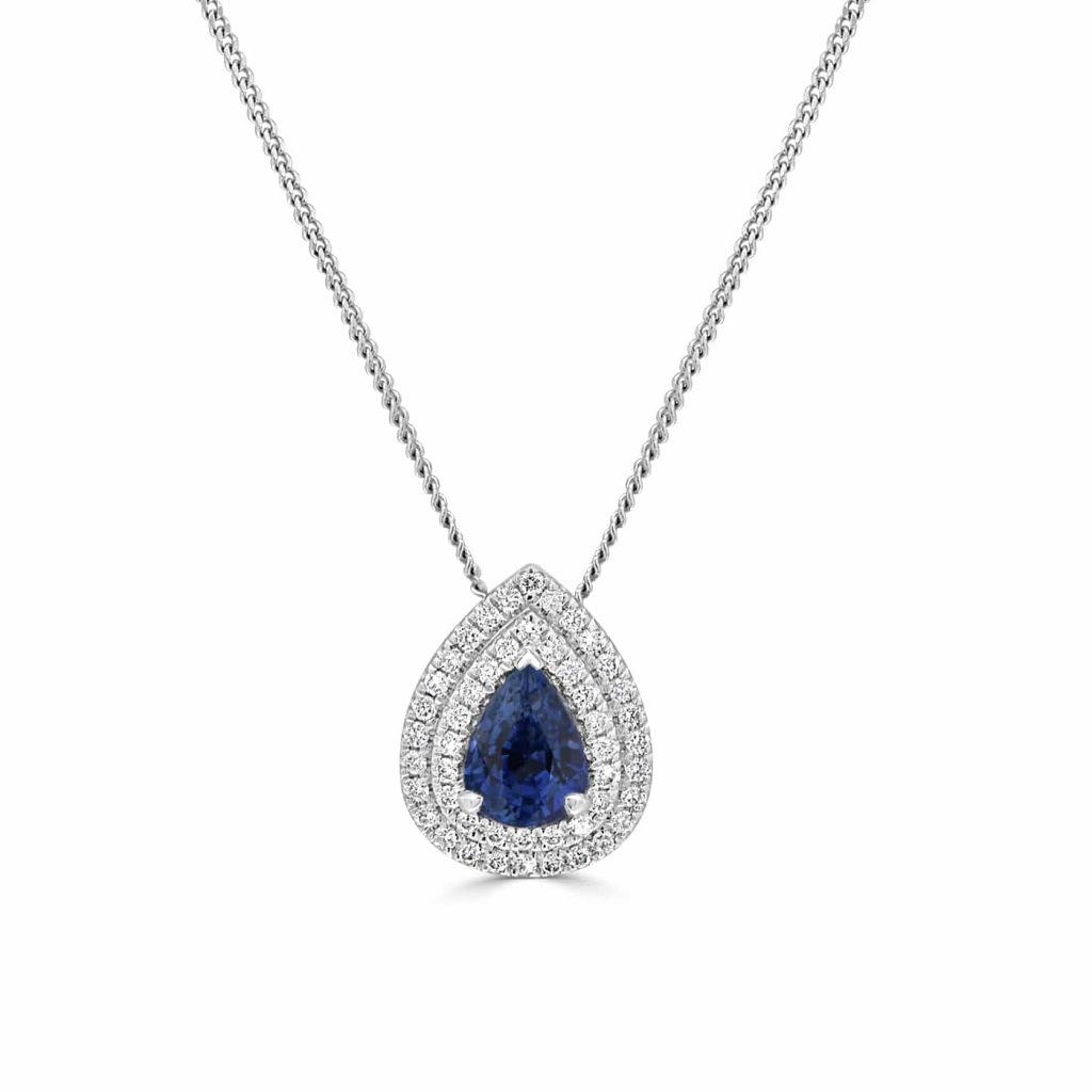 Pear Shaped Sapphire pendant with diamond halo