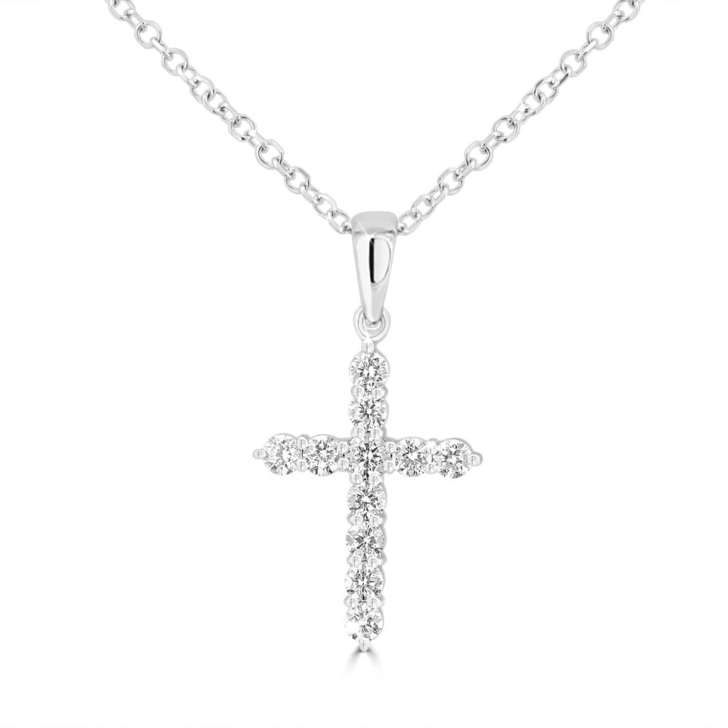 Diamond cross pendant in gold