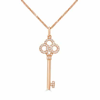 Rose gold diamond key pendant