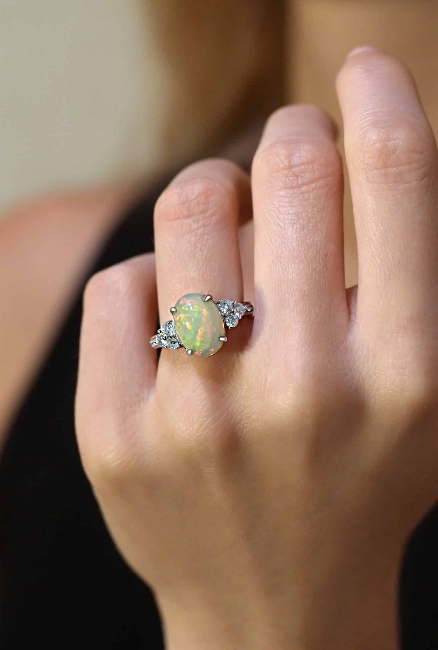 Elegant opal ring on hand